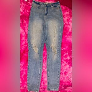 Fashion Nova Jeans,  size 7 and light wash distressed denim jeans.